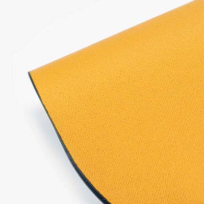 Reversible PROMATTOO oval placemat showing crocodile-look embossing and contrasting crosshatch reverse
